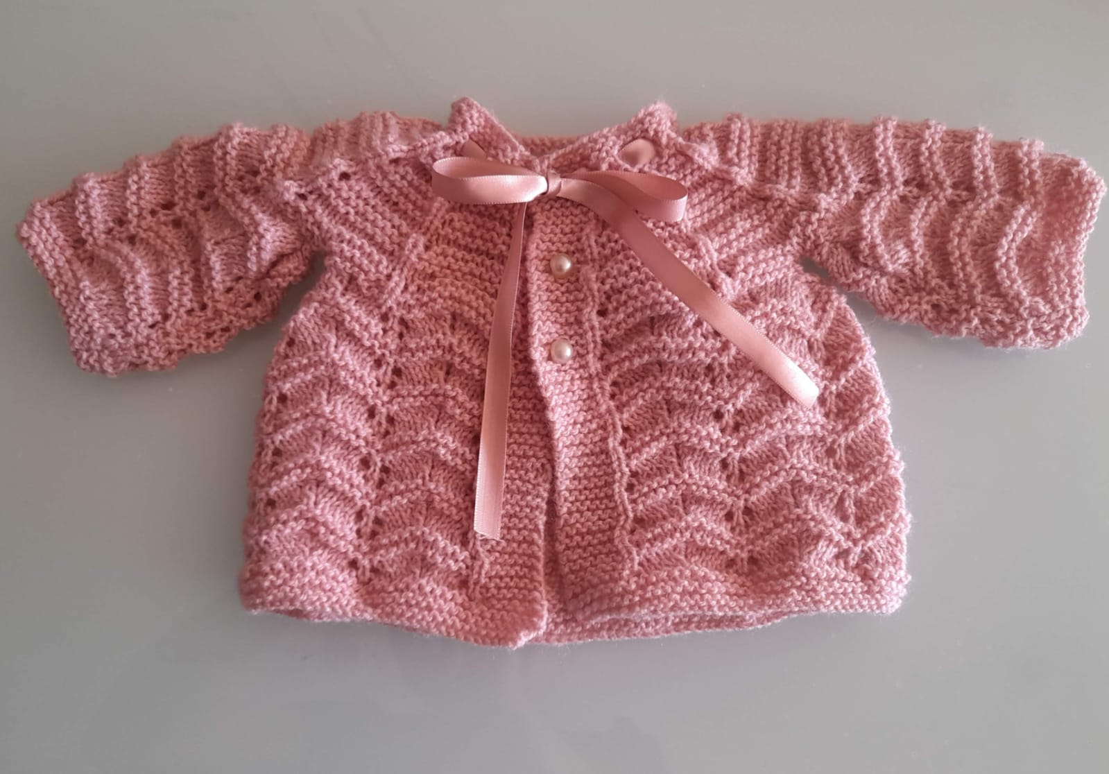 Casaquinho de bebê